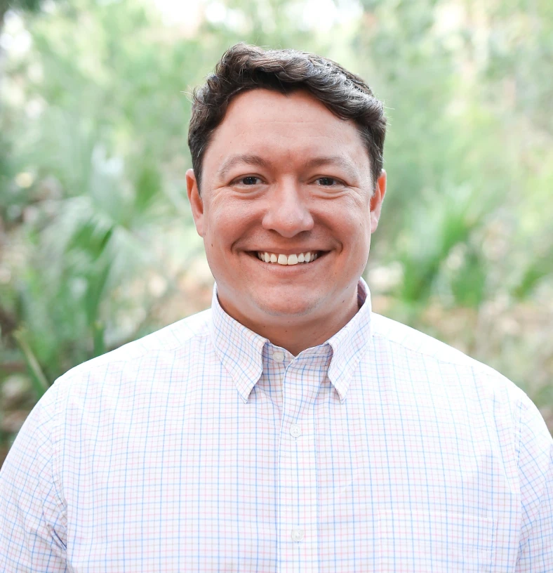 Smiling man in outdoor setting